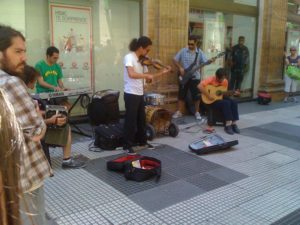 A tango band plays in a Buenos Aires street