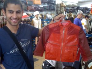 Argentinian child-sized red leather and suede jacket.