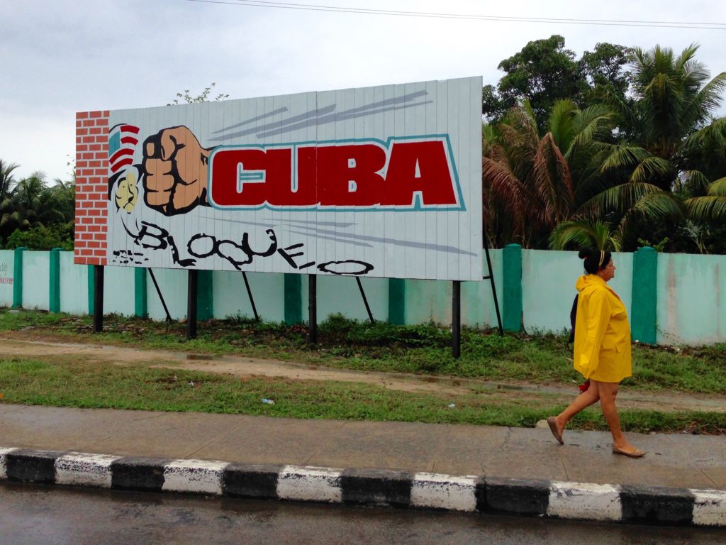 This billboard in Cienfuegos, Cuba is one of my favorites! It shows the fist of Cuba punching out Uncle Sam's embargo.