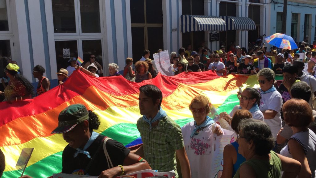 The parade/march/conga began with a giant Cuban flag, closely followed by this giant rainbow flag